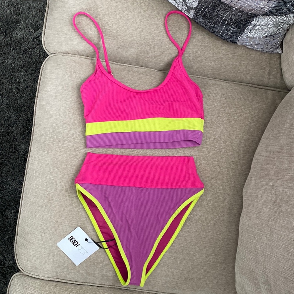 Beach riot- worn once. Still looks like it’s in brand new condition though.